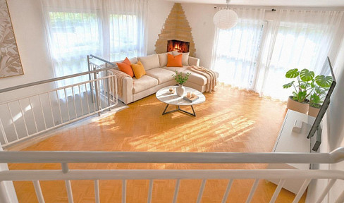 Two-story apartment with 2 parking spaces, eat-in kitchen, 2 bathrooms, balcony, and terrace.