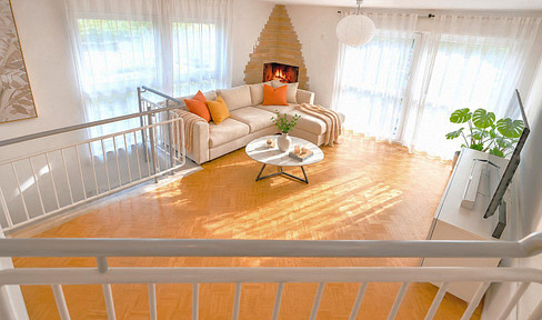 Two-story apartment with 2 parking spaces, eat-in kitchen, 2 bathrooms, balcony, and terrace.