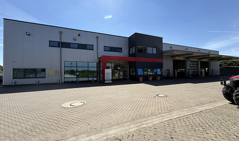 Modern technology center with an exhibition hall and a large plot of land, located directly on the B444 road.