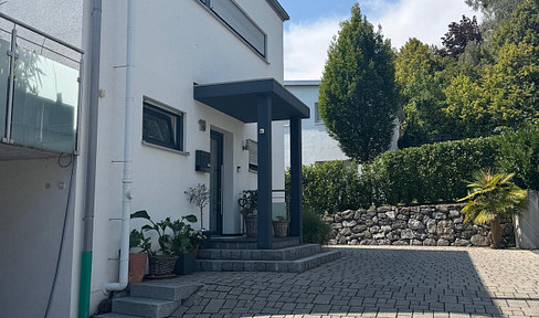 Dreamlike single-family home with lake views in Guggenbühl.
