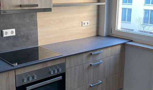 3-room apartment with fitted kitchen and a share of the garden.