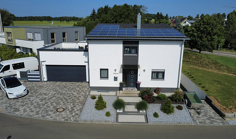 "Sanctuary of Comfort" – a modern single-family home with an attached apartment.