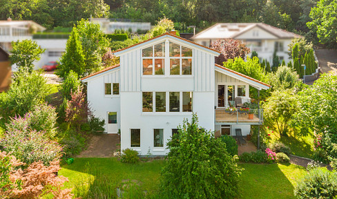 Detached house for sale with a stunning view of Northeim and the Leine Valley.