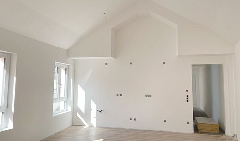 Very high-quality, very bright 3-room loft apartment with a fitted kitchen and a very large rooftop terrace.
