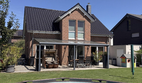 Modernes Massivhaus in ruhiger Neubausiedlung: Südausrichtung, Terrassendach, Sauna & 9m-Garage