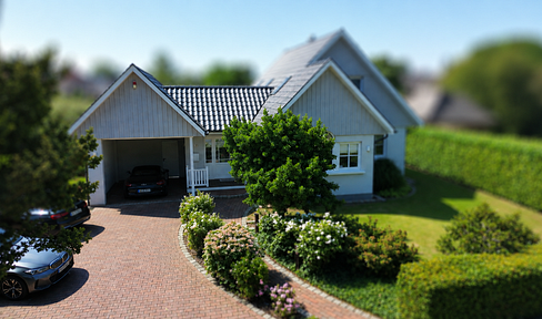 High-quality detached house in a prime location in the heart of Grasberg.