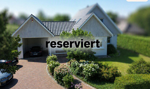 High-quality detached house in a prime location in the heart of Grasberg.