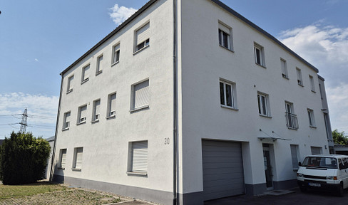 Commercial space for rent, suitable for storage, production, or retail.