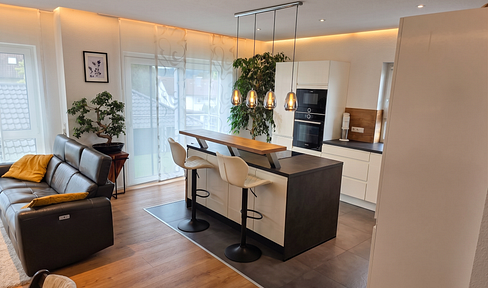 Modern 4-room apartment on the top floor, featuring solar panels, a heat pump, and smart home technology.