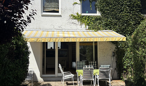 Gepflegtes Reihenmittelhaus mit Dachstudio, Südgarten und flexibler Raumaufteilung