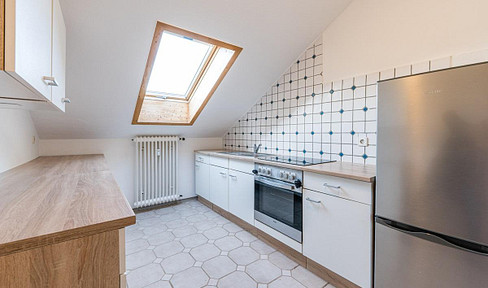 Attractive 3-room attic apartment with a view of Switzerland.