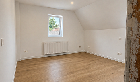 Modern 3-room attic apartment with high-quality finishes, located in a prime location in Heroldsberg.