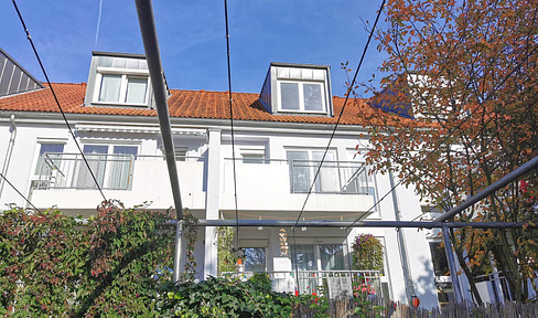 Family-friendly 4-room maisonette apartment with fitted kitchen and balcony.