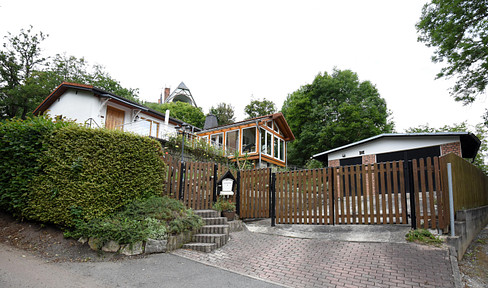Small single-family house in a bungalow style.