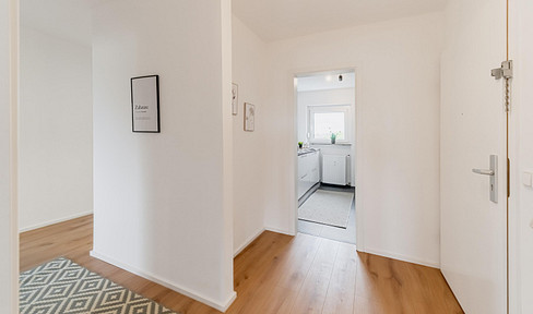 Completely renovated 4-room apartment with a balcony and garage, located in a quiet area of Ehningen.