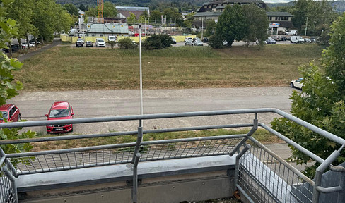 Helle 2-Zimmer-Wohnung mit Terrasse, Einbauküche & Tiefgaragenstellplatz