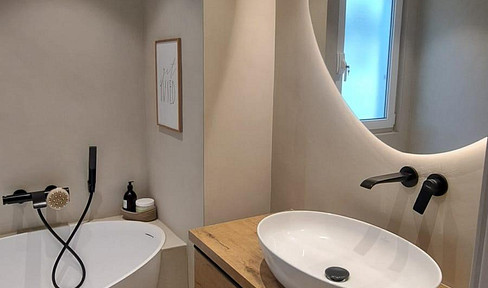 Großzügige 4-Zimmer-Maisonettewohnung im Erdgeschoss in gehobener Halbhöhenlage mit Garten
