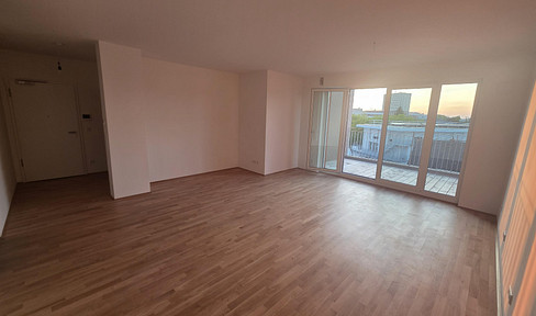 Brand new 3-room apartment with a balcony and panoramic views of Darmstadt – features a modern fitted kitchen, parquet flooring, and underground parking.