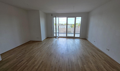 Brand new 3-room apartment with a balcony and panoramic views of Darmstadt – features a modern fitted kitchen, parquet flooring, and underground parking.