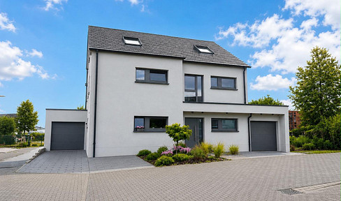 Modern, high-quality semi-detached house with a garden, located in Sinzig-Franken.