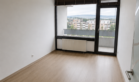 Bright, newly renovated 3-room maisonette apartment with a balcony in Mainz-Finthen.