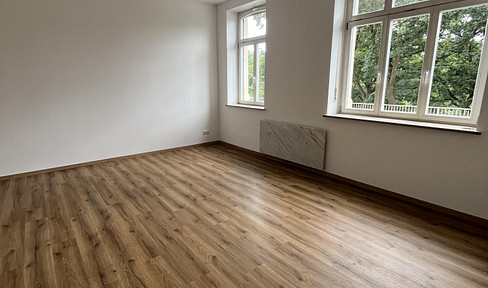 Bright 3-room apartment with balcony and garden.