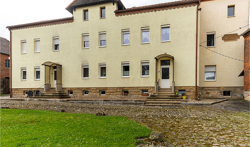 Attractive multi-family house on a 7848 m² plot.