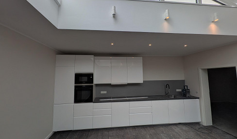 Brand new! Modern 5-room apartment in Rüdesheim, featuring a fitted kitchen, terrace, and underfloor heating.