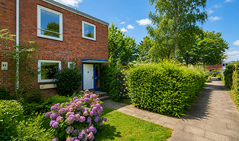 Lichtdurchflutetes Familienhaus mit großzügigem Wohnbereich, Kamin und Südwestgarten