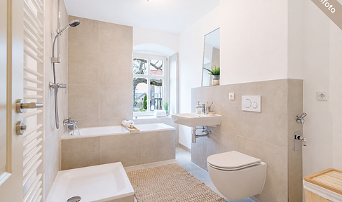 Beautiful four-room apartment with a terrace, garden, and parking space.