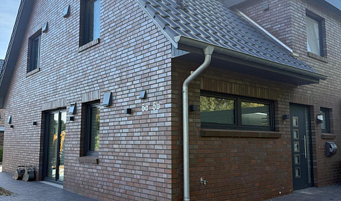 Modern home in a green setting - bright semi-detached house in a quiet, rural location.