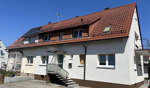 Spacious 5-room apartment with a garden, terrace, and garage.