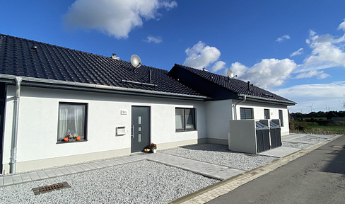 Well-maintained and modern bungalow with a terrace and garage, located in Luckau.