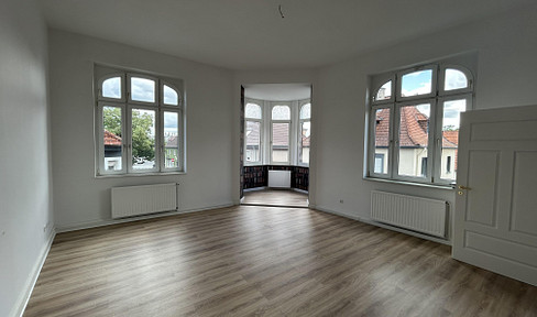Renovated apartment in a historic building within a protected complex.
