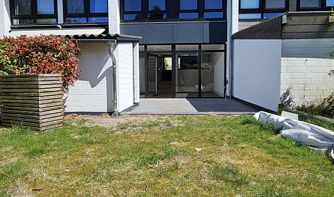 Brand new terraced house, with underfloor heating, a new roof, its own garden, and a garage.