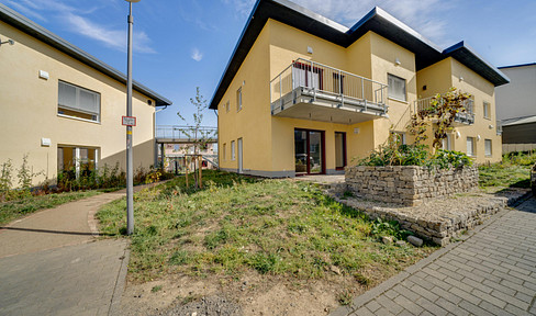 Energy-efficient apartment building with terraces, parking space, and 250 square meters of additional communal areas.