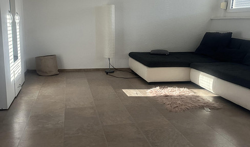 A cozy room in a shared apartment, with a view over the rooftops of Heilbronn.