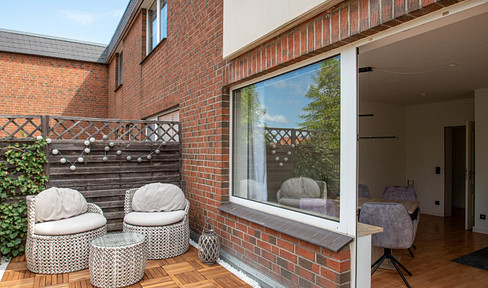 2-room apartment with a rooftop terrace, centrally located in Adendorf, renovated.
