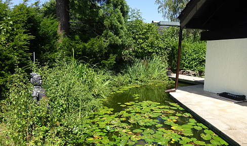 Large maisonette apartment with garden and pond.