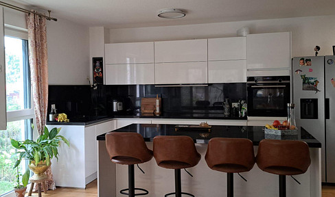 Brand new and modern 4-room apartment with a garden.