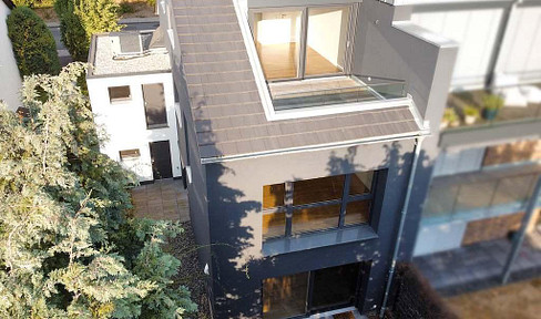 Attraktive Maisonettewohnung mit Haus-im-Haus-Charakter, Dachloggia, Garage
