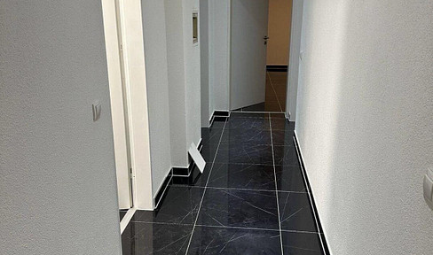 Renovated 4-room apartment with balcony in Willroth.