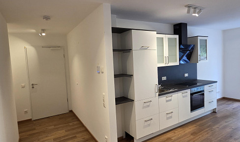 Neubau - Erstbezug - sofort verfügbar! Exklusive 2-Zi-Wohnung mit EBK und Garten sowie Tiefgarage