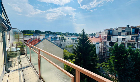 Helle Dachgeschosswohnung mit sonniger 7 m² Westterrasse und Garagenplatz in absoluter Ruhelage