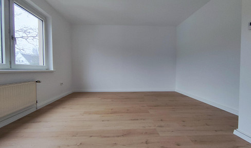 Renovierte 2,5-Zimmer-Wohnung mit Balkon und Gartennutzung