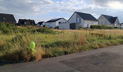 Building plot II for a single-family or multi-family house, located at "Am Obsthof 61."