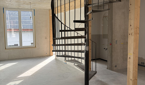 Two-story apartment with 2 balconies.