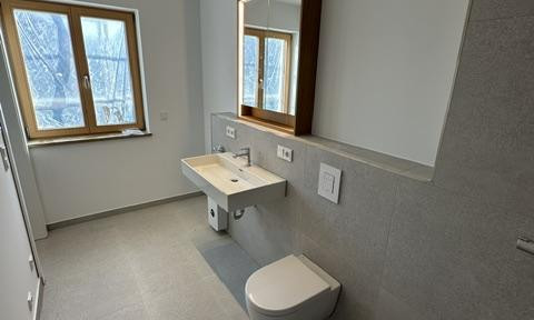 New construction - First occupancy - Duplex apartment - 3 rooms including fitted kitchen, parking space, cellar, approximately 66 square meters of living space.