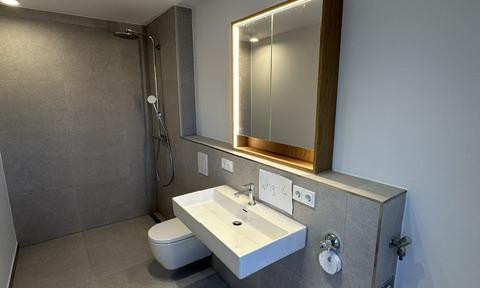 New construction - First occupancy - Duplex apartment - 3 rooms including fitted kitchen, balcony, parking space, cellar, approximately 69m² of living space.