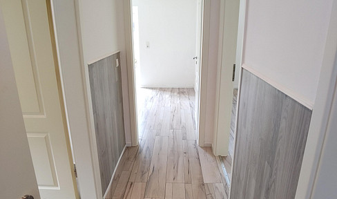 Quiet 2-room apartment with fitted kitchen and parking space.